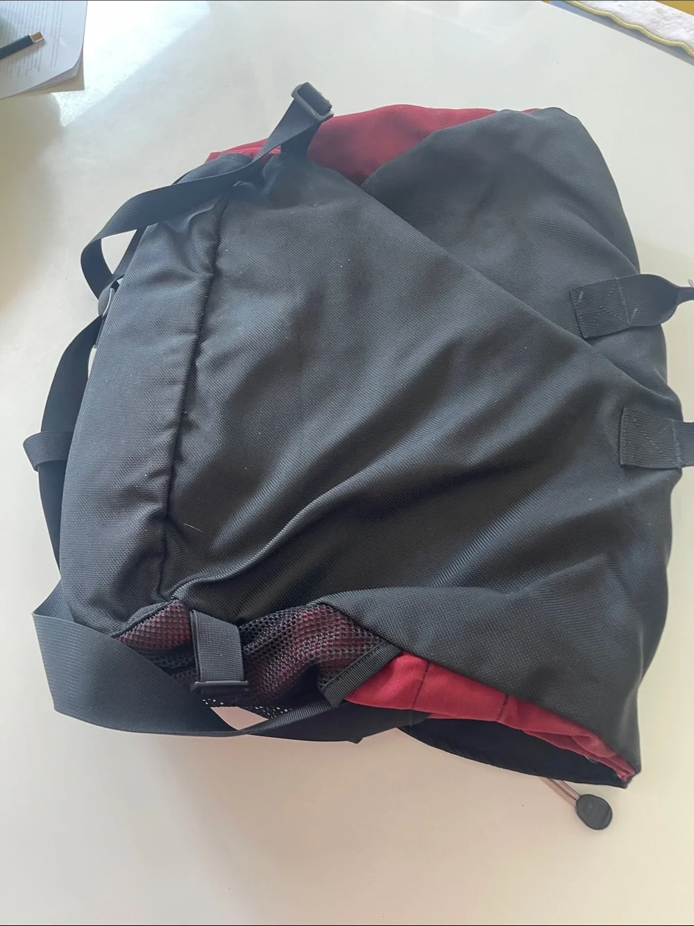 REI Muaette Black and Red Messenger Bag